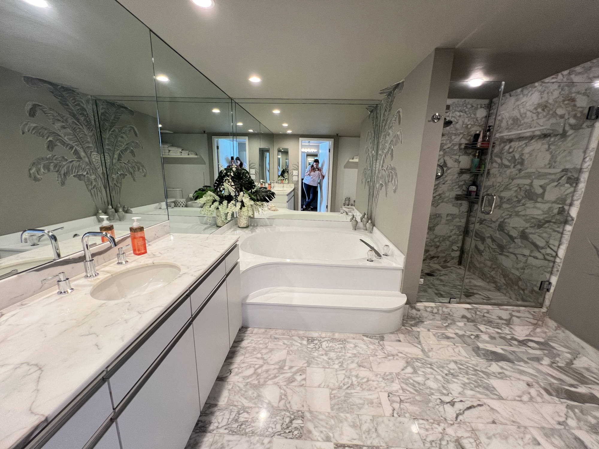 master bathroom with a reflection of the best realtor in Miami Beach Patricia
