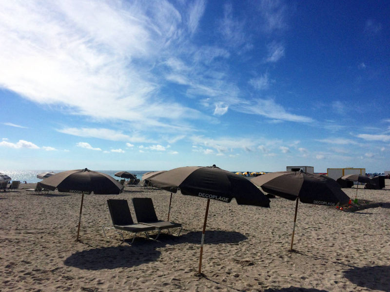 beach chairs and umrellas 