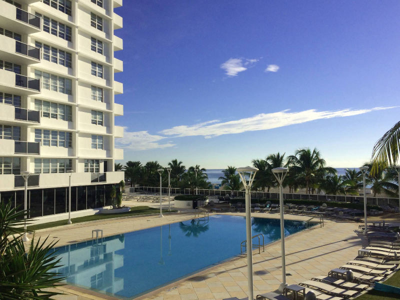 pool with ocean in background 