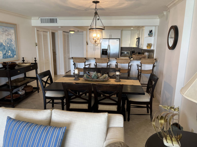 dining table with kitchen in background