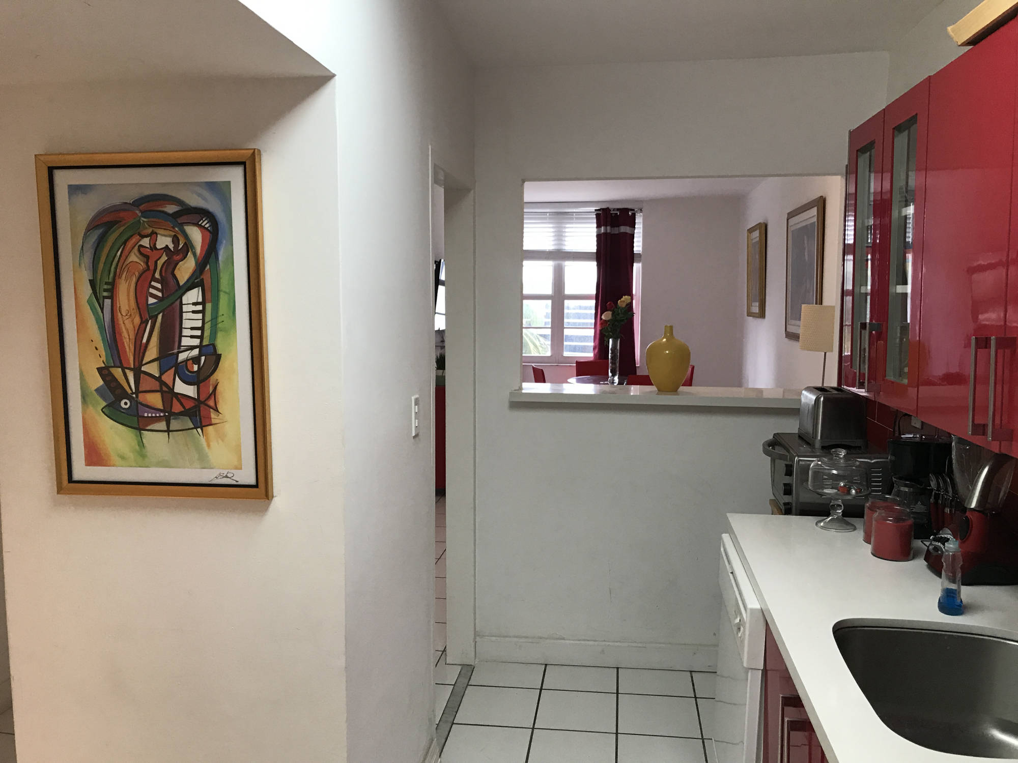 Kitchen with red cabinets