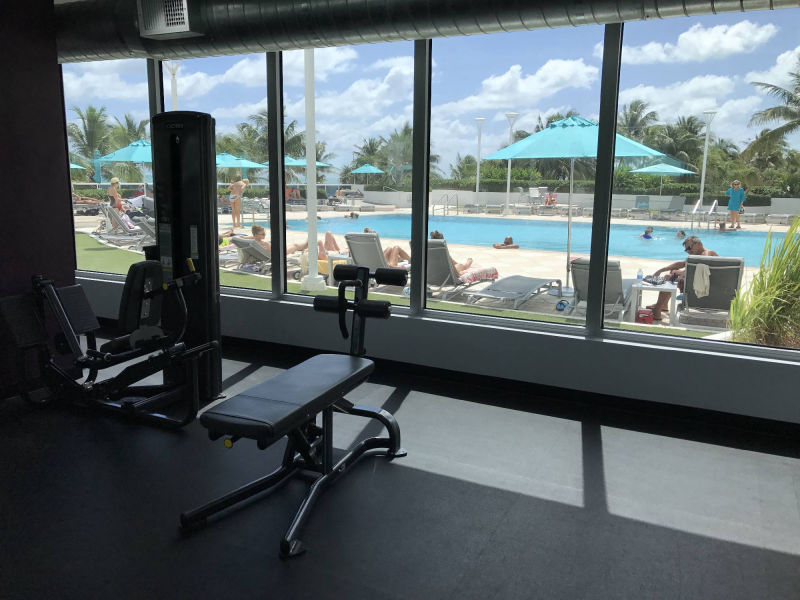 gym with pool view