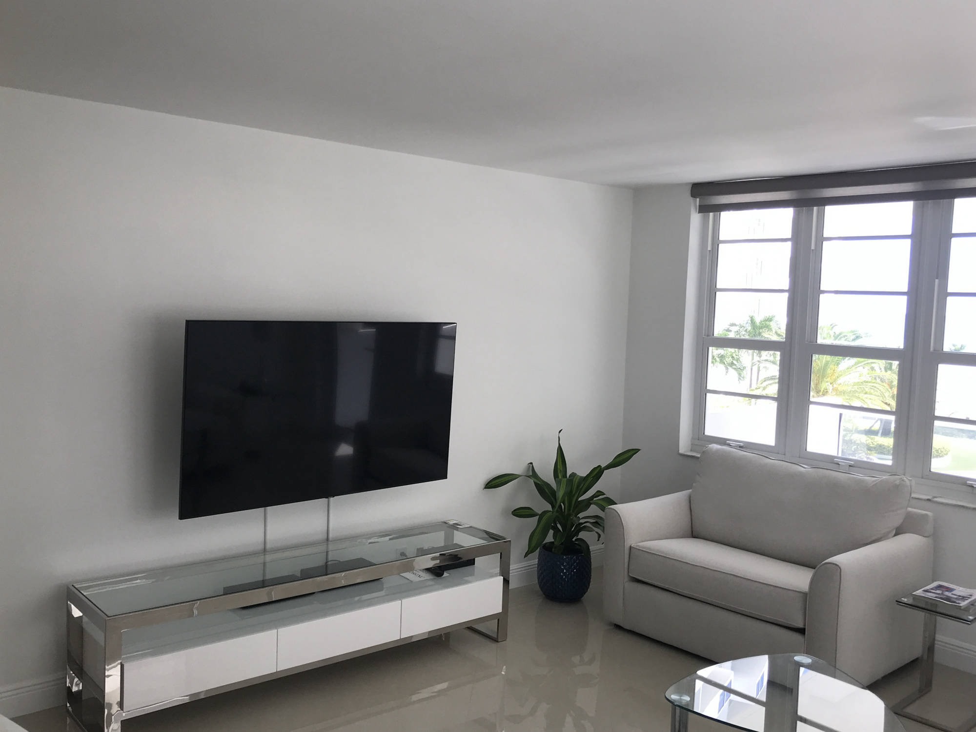 living room with TV and beach view